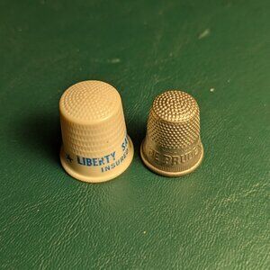 Lot of 2 vintage advertising thimbles: Prudential Insurance, Liberty Savings